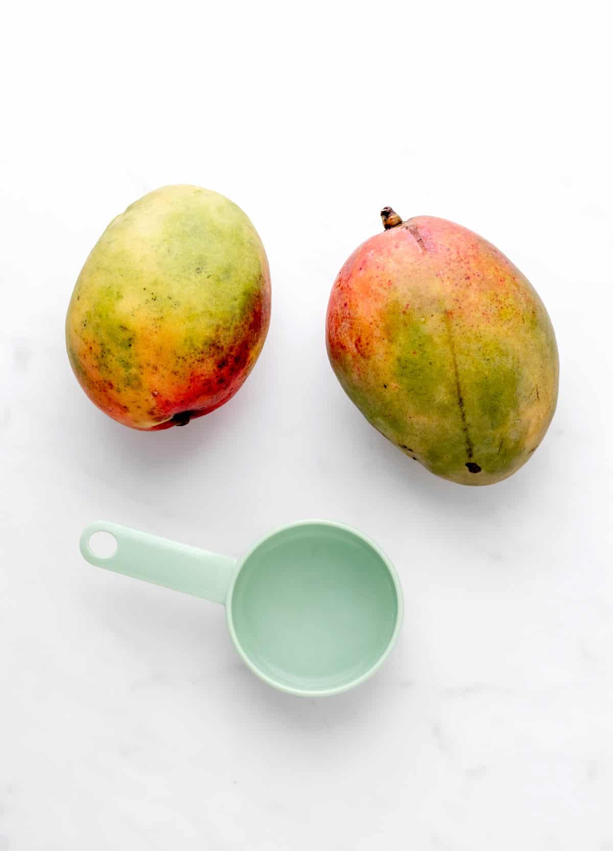 Ingredients for baby mango puree recipe.