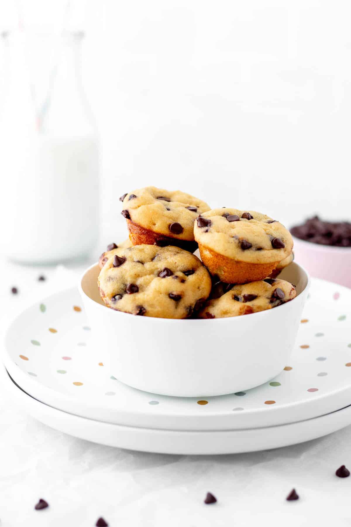 A bowl full of healthy mini chocolate chip muffins.