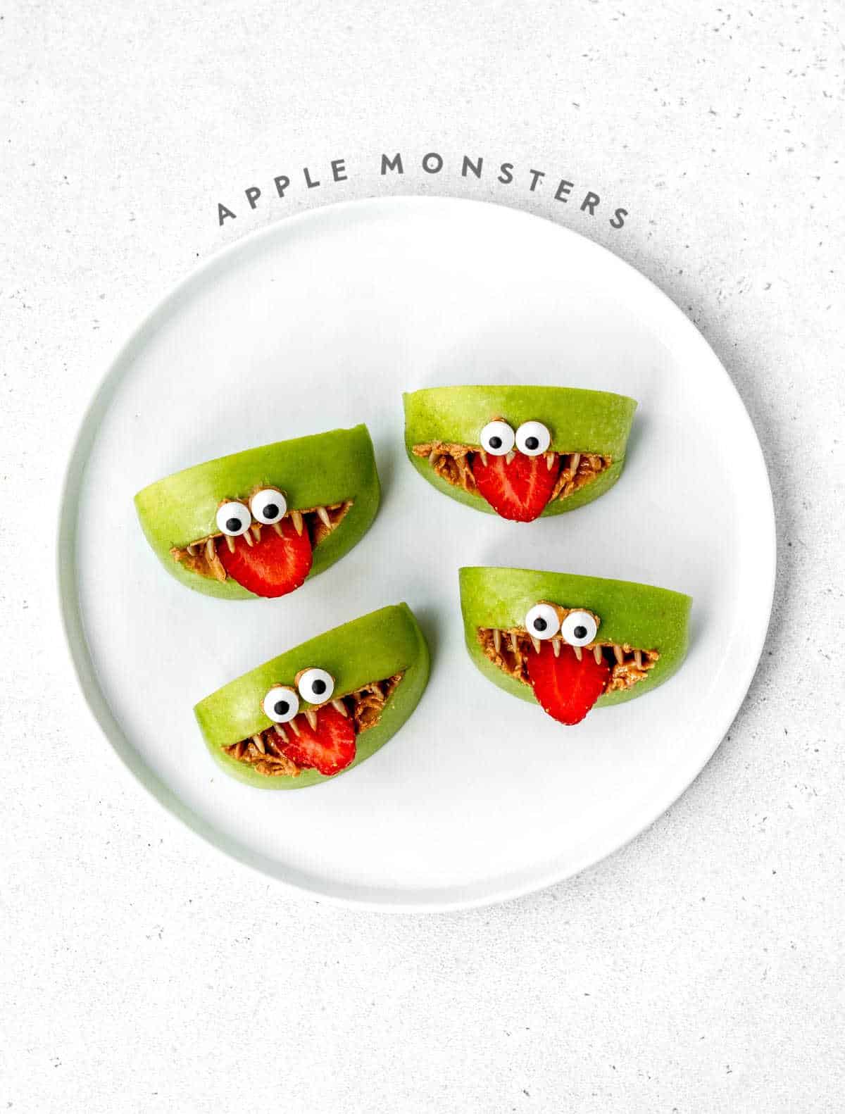 Apple Monsters on a white plate.
