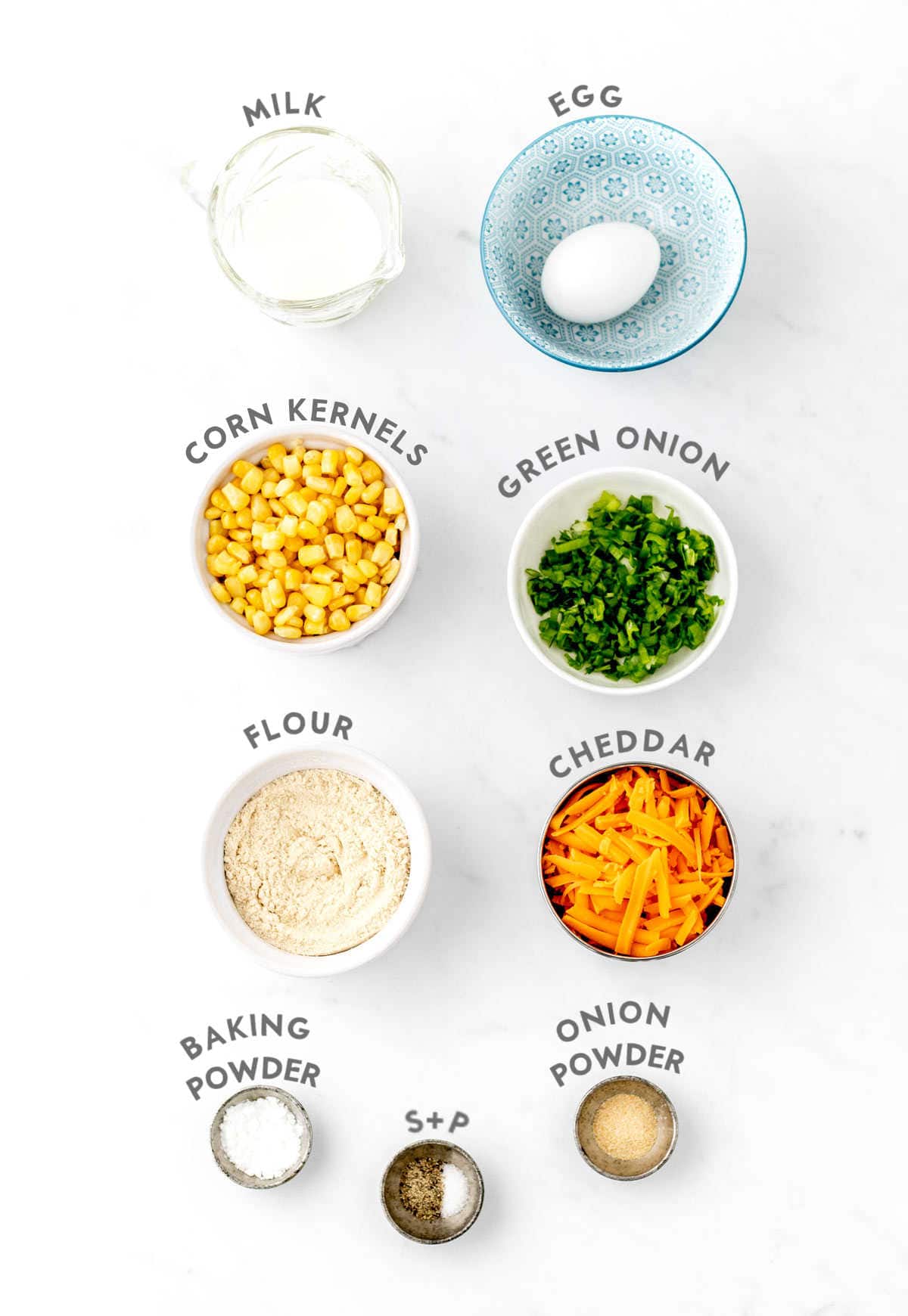 Labelled ingredients required to make healthy corn fritters recipe.