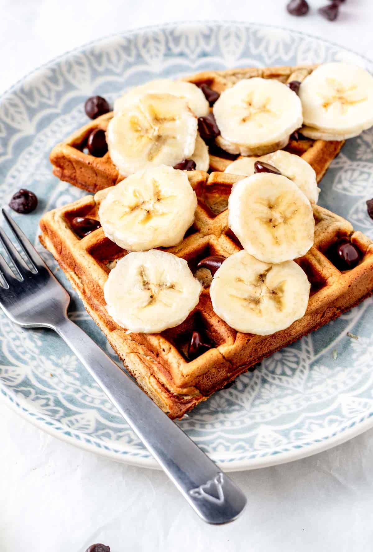 3-ingredient banana waffles on a plate with a fork.