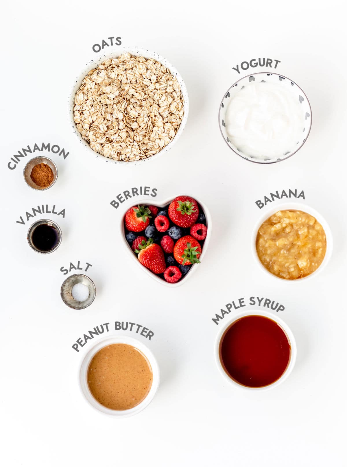 Ingredients required for granola cups with yogurt and berries.